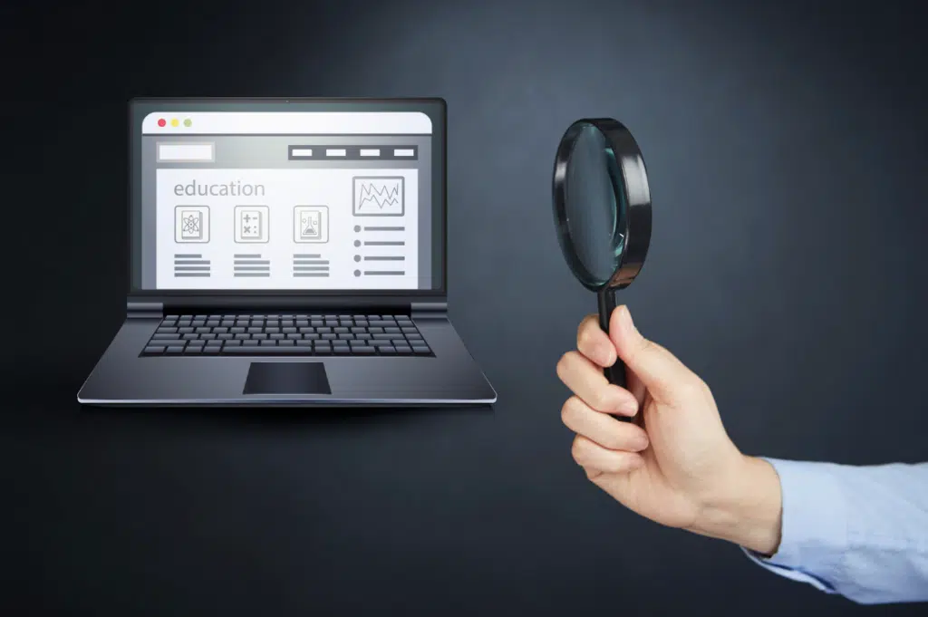 An image showing a magnifying glass searching through a website, representing the importance of search in websites for optimizing site search functionality.